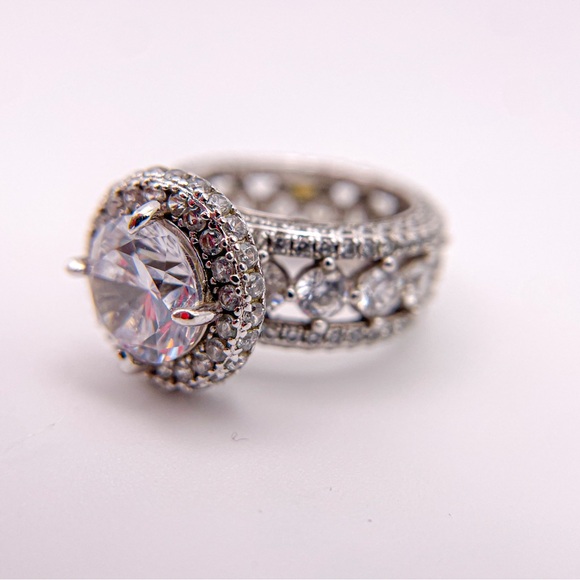 Round cut cubic zirconia silver toned ring with round accents. Size 5. - Picture 11 of 14